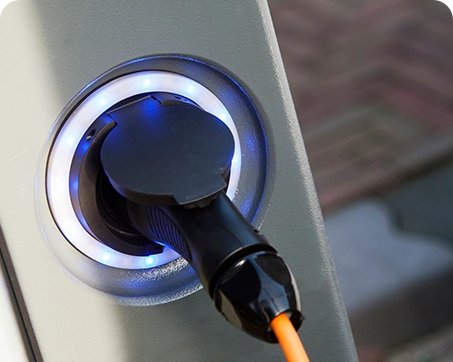 A close up of an electric car charging